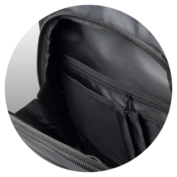 A close-up of the interior of a grey backpack featuring multiple pockets and a zippered compartment.