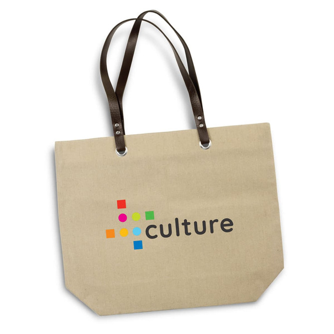 A beige tote bag with brown straps, featuring a logo in multicoloured dots and the word "culture."