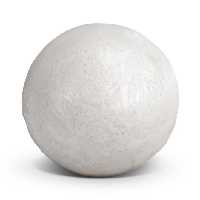 A round white bath bomb with a smooth surface, featuring minimal detailing and a soft sheen.
