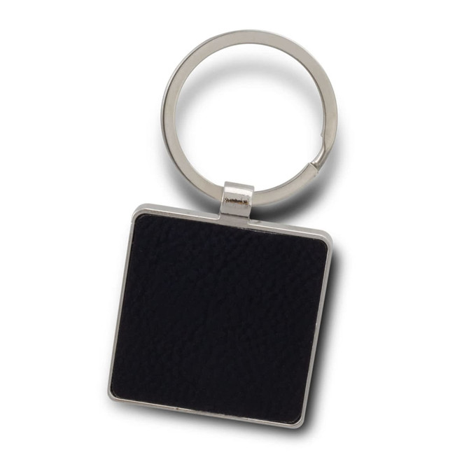 A square black key ring with a silver metal attachment. The key ring features a smooth, textured surface.