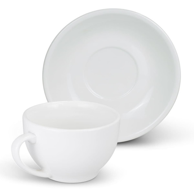 A white chai cup and matching saucer, both featuring a smooth, glossy finish and a simple design.