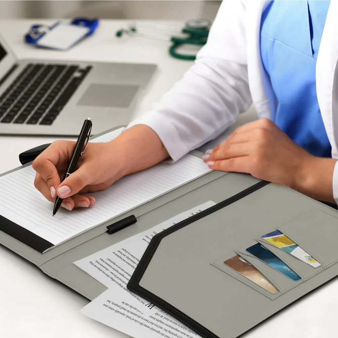 A black portfolio with a smooth finish, featuring a logo on the cover.