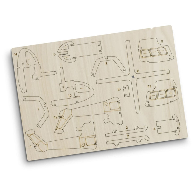 A wooden model helicopter kit featuring various laser-cut pieces in natural wood colour. Includes detailed outlines for assembly.