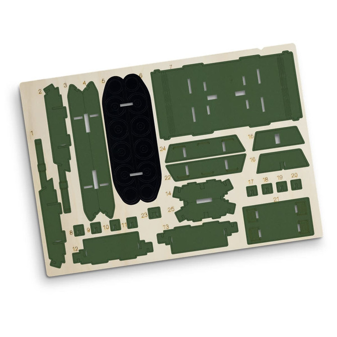 A wooden model kit featuring various green and black pieces for assembly, presented on a light wood base.