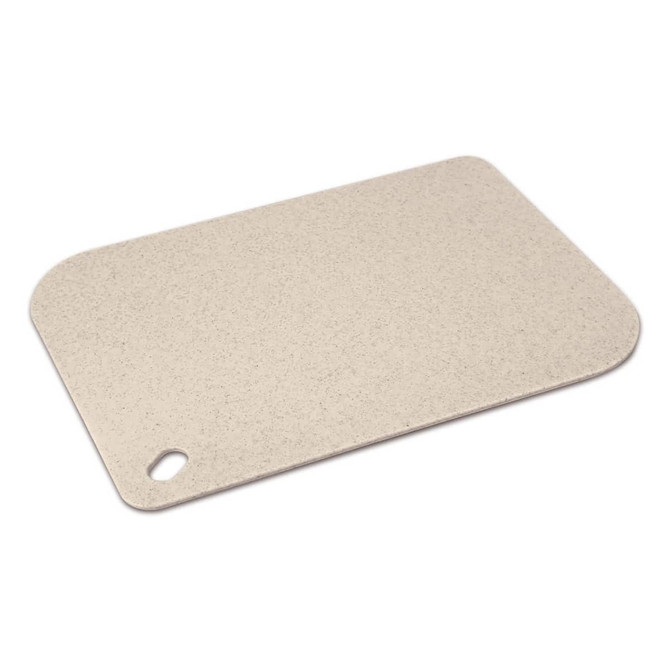 A light beige chopping board with a rounded corner and a hole for hanging. It features a smooth, speckled surface and has a logo.