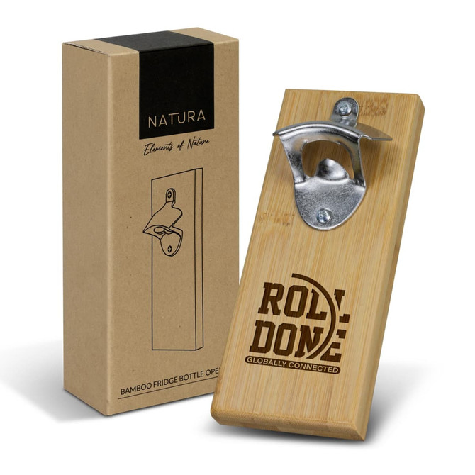 A drink bottle opener made from bamboo with a metal cap remover, displayed next to a cardboard box featuring a logo.