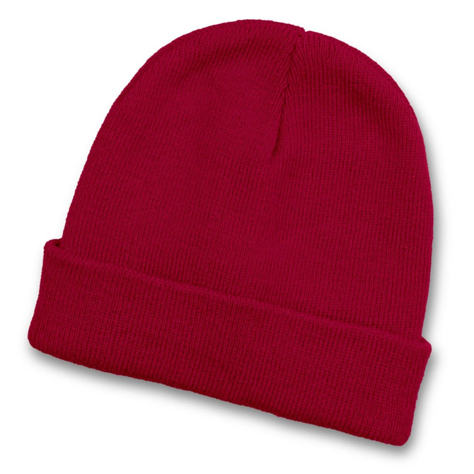 A red beanie with a folded cuff and a textured knit design.