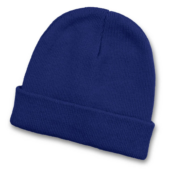 A blue knitted beanie with a folded cuff and a plain design, featuring a logo on one side.