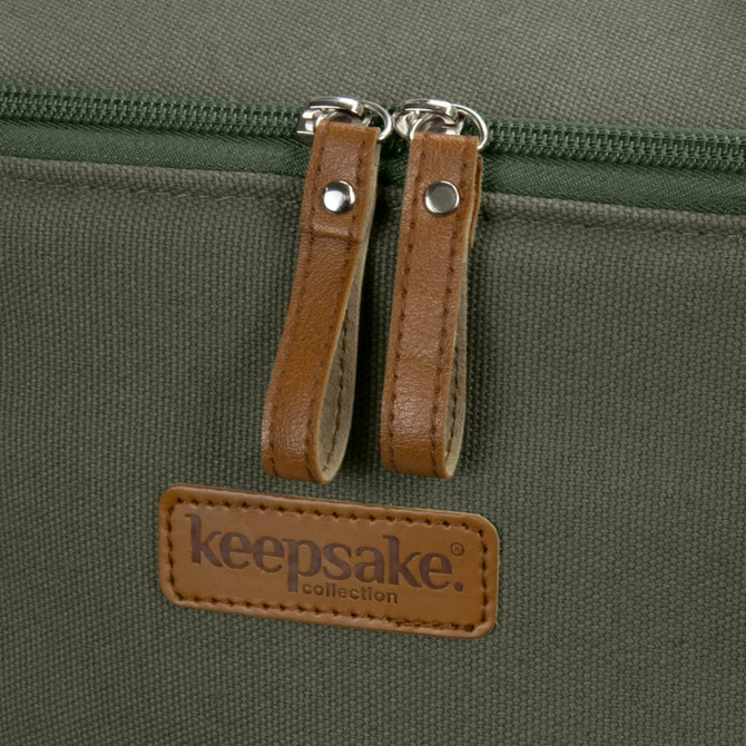 A green cooler bag featuring a zip closure with leather pulls and a branded tag.