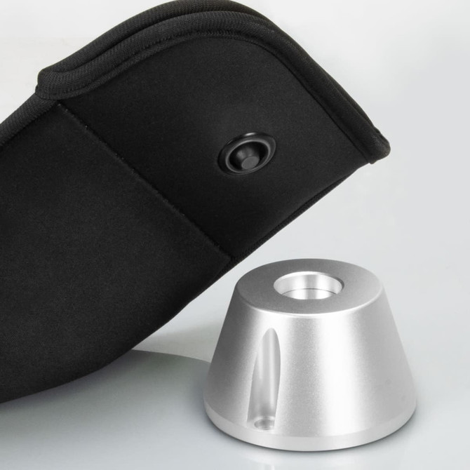 A black pouch with a lock button beside a silver lockable phone pouch base.