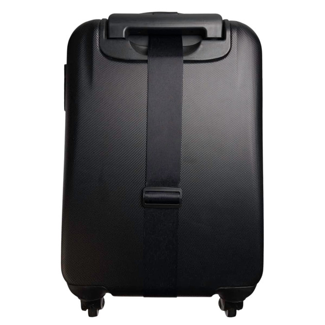 A black suitcase featuring a sleek luggage strap securing it in place.
