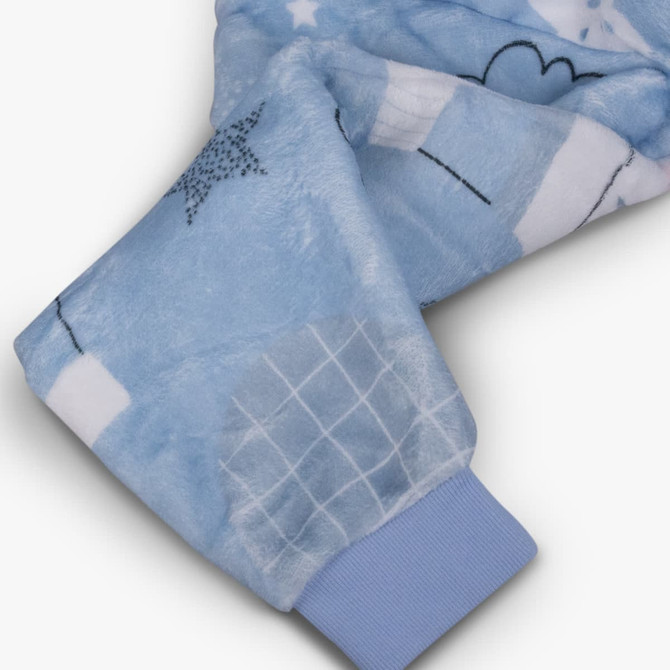 A soft blue blanket hoodie with a textured pattern and ribbed cuffs, featuring a logo.
