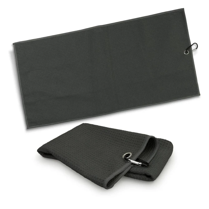A dark grey waffle golf towel, featuring a hook for attachment, displayed unfolded and folded.
