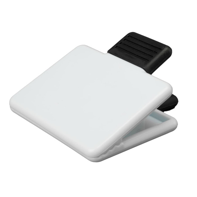 A white magnetic clip with a black grip at the top.