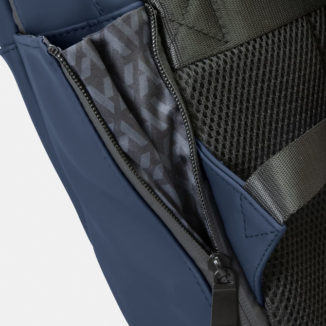 A close-up of a blue backpack showcasing a zippered pocket with a textured interior lining. It features mesh material and straps.