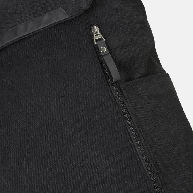 A black canvas backpack featuring a zippered compartment and a side pocket, with a logo on its surface.