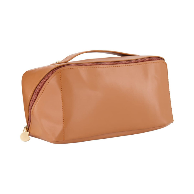 A tan toiletry bag with a smooth finish and a zippered closure, featuring a handle on top and a logo.