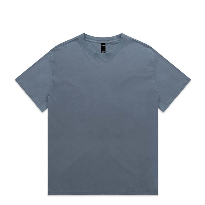 A heavy faded t-shirt in a soft grey colour, featuring a casual v-neck design and a small logo.