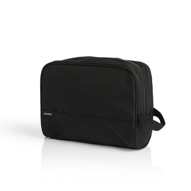 A black recycled toiletry bag with a rectangular shape and a side handle, featuring a logo.