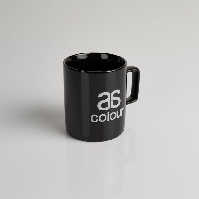 A black coffee mug with a glossy finish and a handle, featuring a logo.