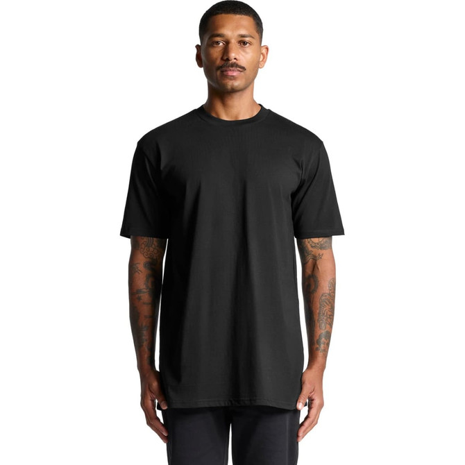 A black Classic Plus Tee [+5cm] with short sleeves, featuring a logo, displayed on a model.