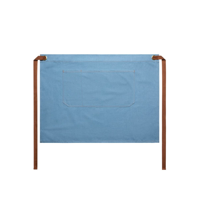 A denim half apron in a light blue colour with brown straps and a front pocket.