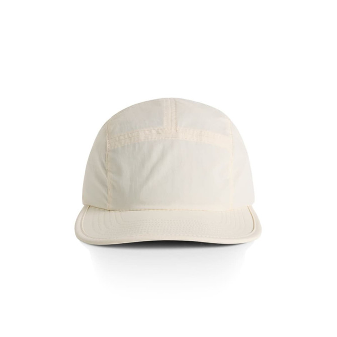 A cream-coloured nylon cap with a curved brim and a logo on the front, designed for casual wear.