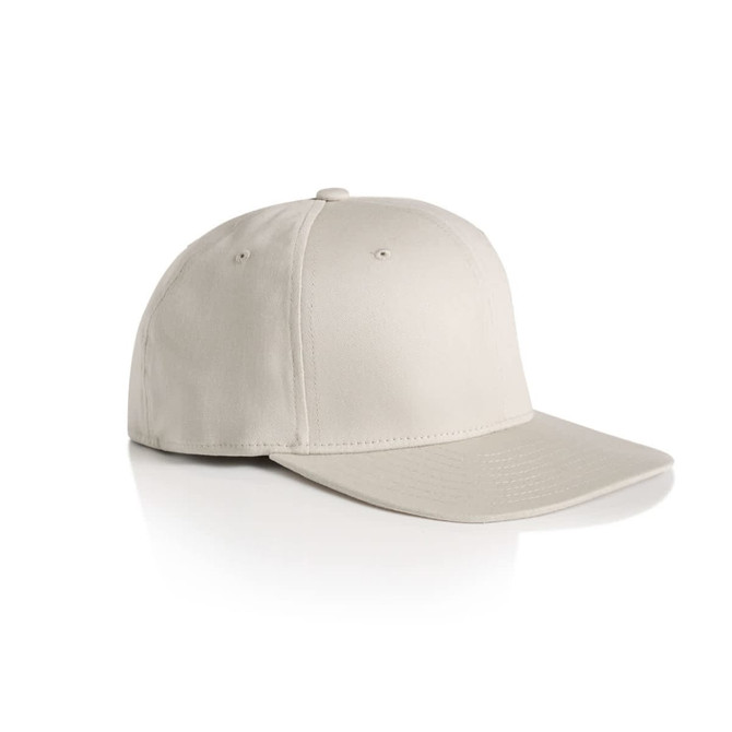 A beige flex cap with a curved peak, featuring a logo on the front. The cap has a smooth, clean design.