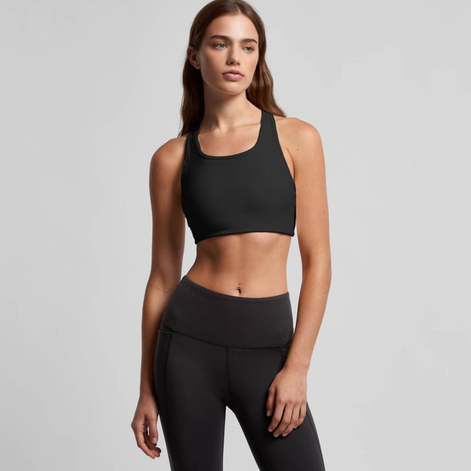 A black sports crop top featuring a simple design and a logo, paired with black high-waisted leggings.
