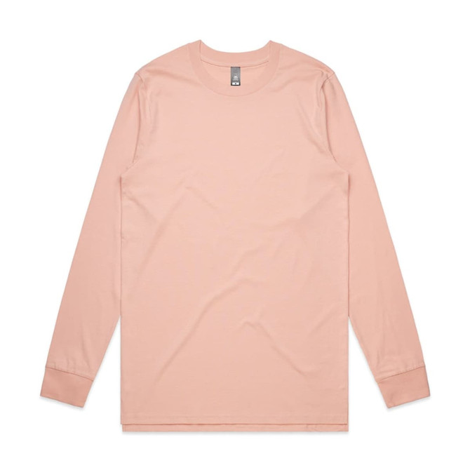 A long-sleeve t-shirt in a soft peach colour, featuring a branded label.