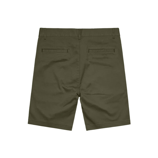 A pair of olive green dress shorts with a logo and two back pockets.
