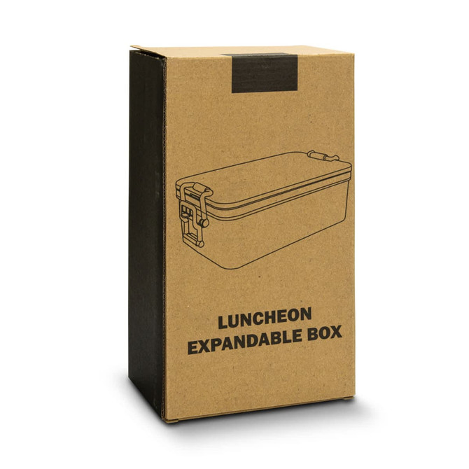 A brown cardboard box containing a drawing of a grey expandable lunch box and a logo.