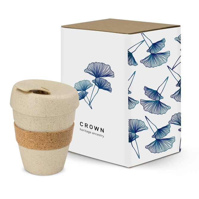 A drink bottle with a natural finish and cork band, displayed beside a decorative box featuring floral designs.