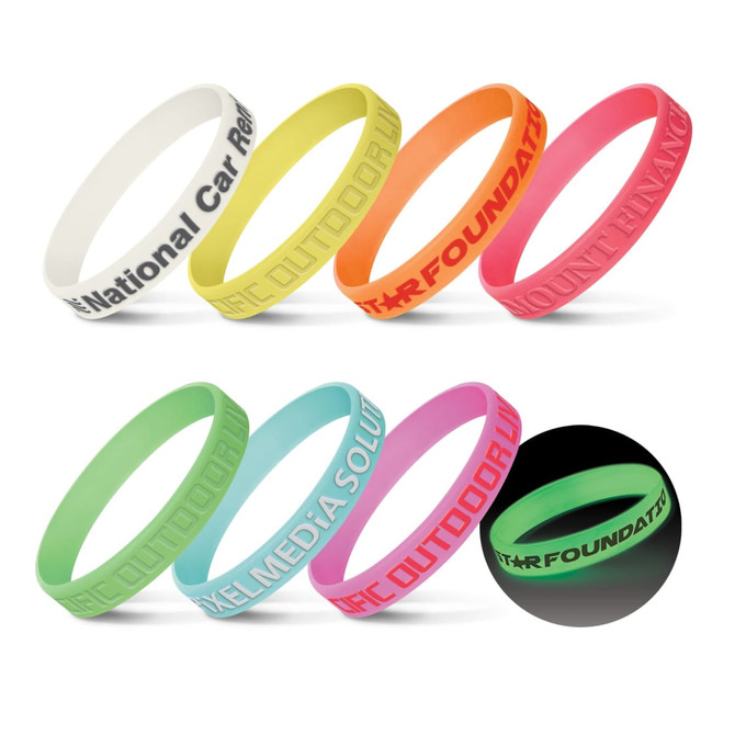 Silicone wristbands in various colours, including white, yellow, orange, pink, green, and glow-in-the-dark black.