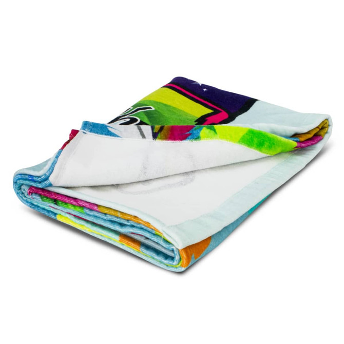 A folded beach towel featuring vibrant colours and an abstract design, with a branded logo.