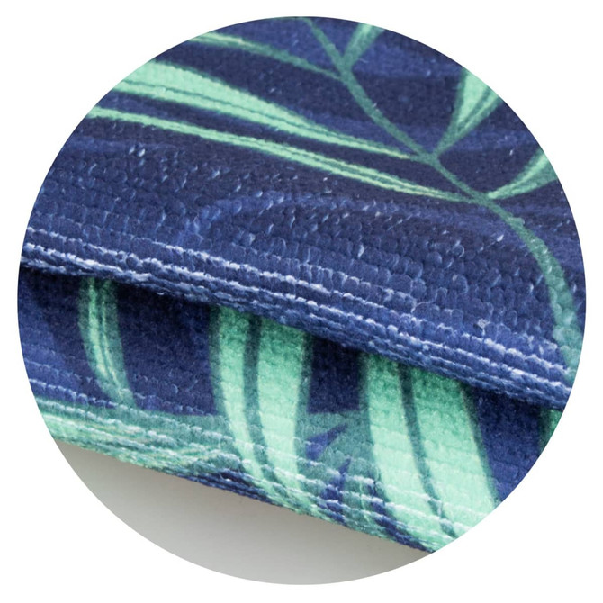 A Marathon Sports Towel featuring a blue and green leaf design, highlighting the textured fabric and vibrant colors.