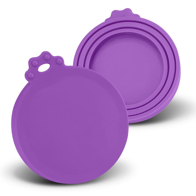 A set of two round purple silicone lids with a textured handle on one. Each lid is smooth and flexible.