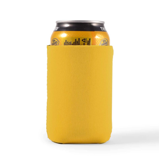 A drink can is nestled inside a yellow stubby cooler, designed to keep beverages cold.