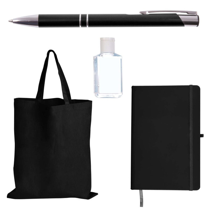 A black tote bag, black pen, sanitizer bottle, and black notebook organized in a promotional product pack.
