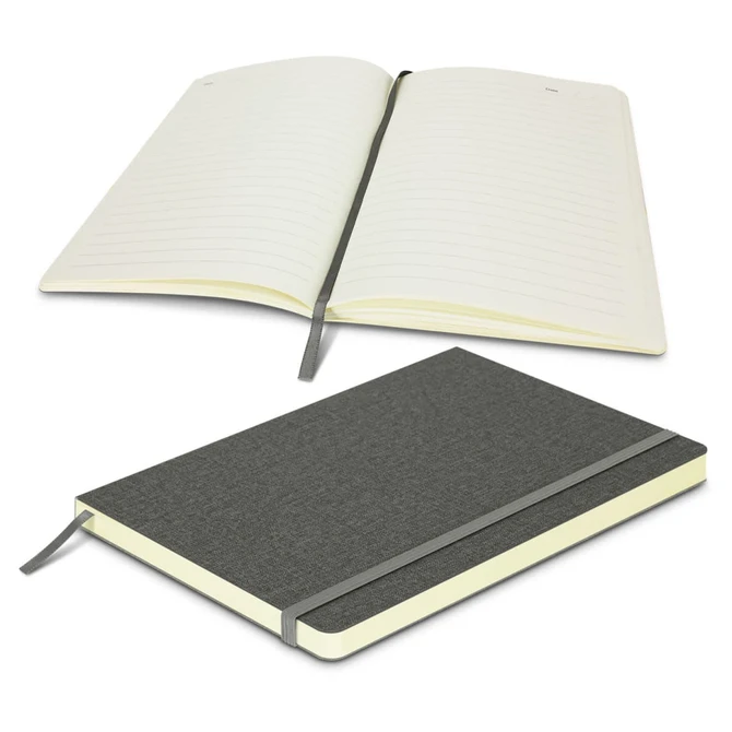 A gray notebook with a textured cover, featuring lined pages and a ribbon bookmark. It has a logo on the cover.
