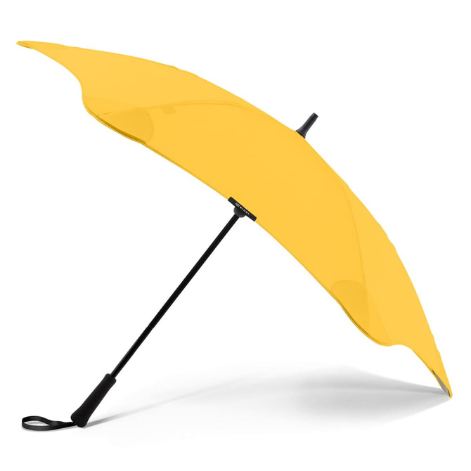 A yellow BLUNT Classic Umbrella with a black handle and frame, designed for weather protection.
