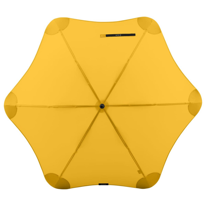 A yellow BLUNT Classic Umbrella with a unique star-shaped canopy design, featuring a central hub and multiple support ribs.