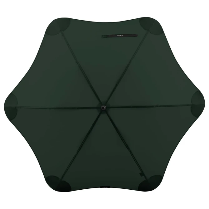 A green BLUNT Classic Umbrella with a unique star-shaped canopy and a central black hub. It has a logo.