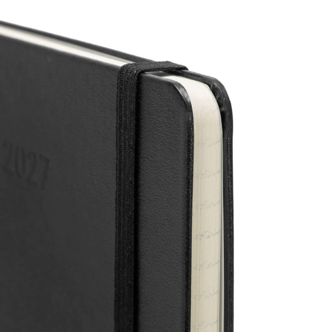 A black Moleskine 2027 planner with a textured cover and an elastic band, featuring rounded corners and cream pages.