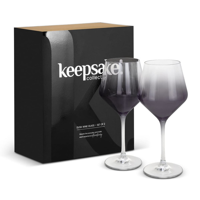 A set of two gradient purple wine glasses with stems, packaged in a sleek black box featuring a logo.