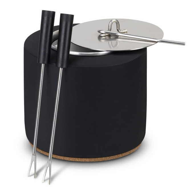 A black keepsake s'mores kit with a cork base, lid, and two stainless steel skewers.