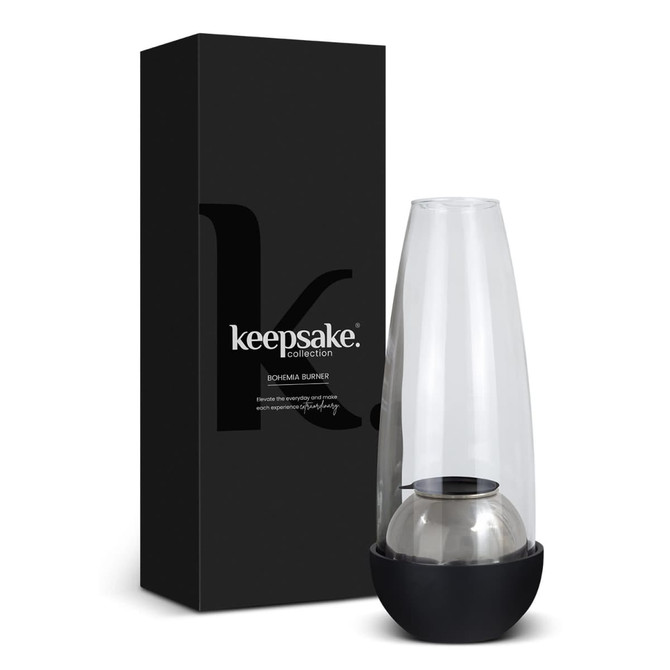 A glass and black Keepsake Bohemia Burner, presented with a sleek black box, showcasing its modern design.