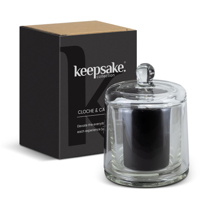 A glass candle in a cloche with a black candle inside, paired with a stylish box, featuring a logo.