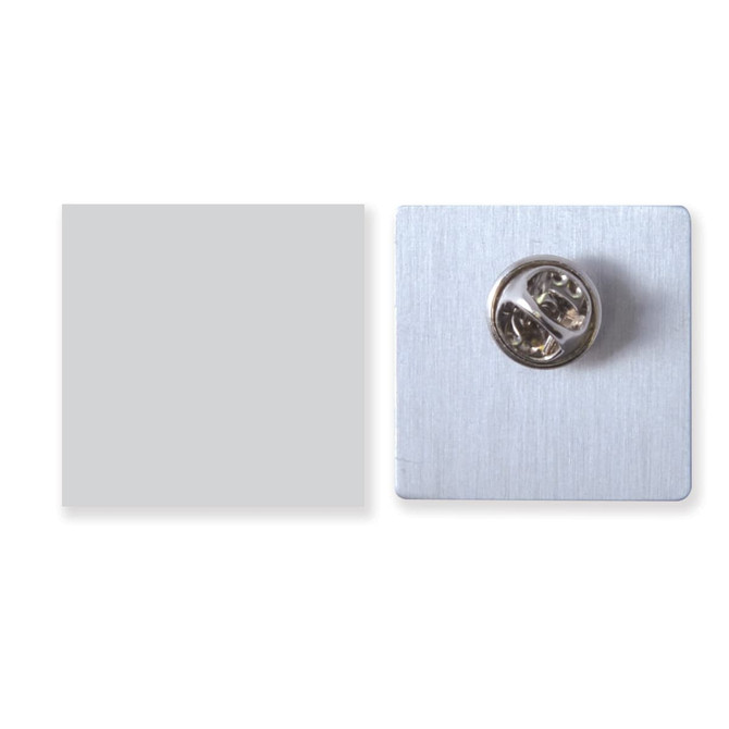 A 25mm aluminium offset print badge in silver, featuring a metal pin on the back and a smooth front surface.