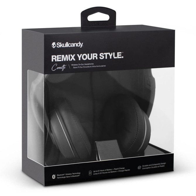 A black Skullcandy Cassette Headphones displayed in a transparent packaging with a logo.